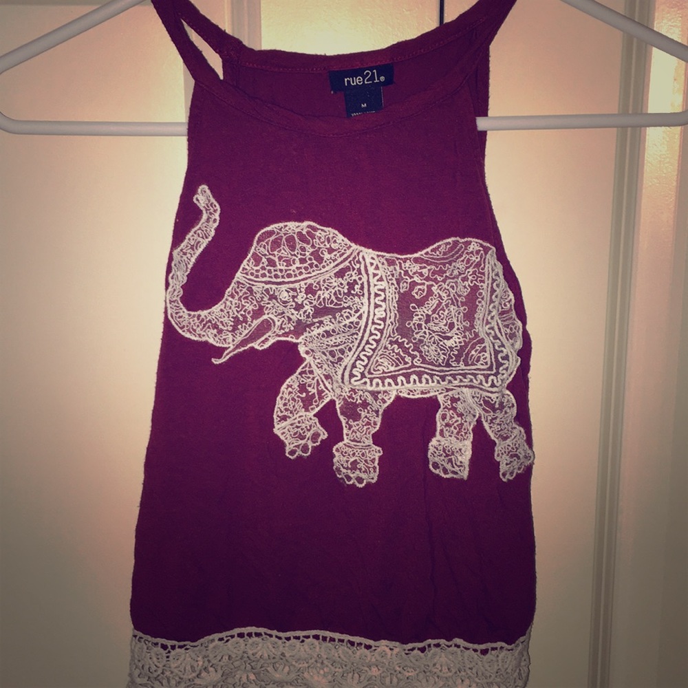 A cute maroon shirt with an elephant